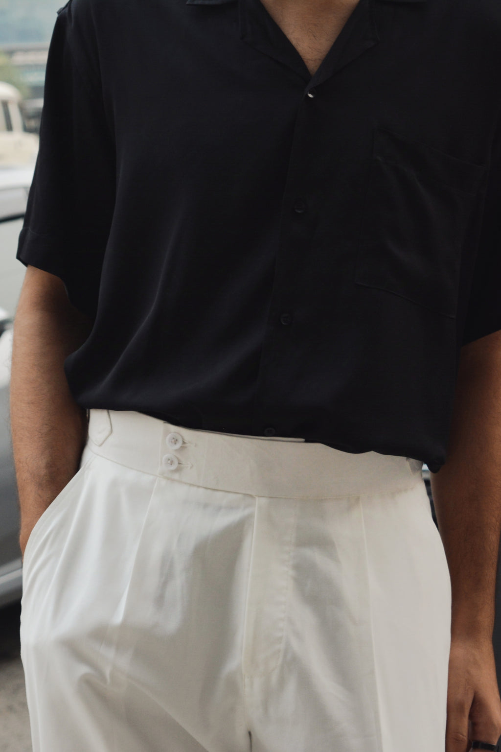 Premium off-white formal pants for men styled with minimal and modern menswear